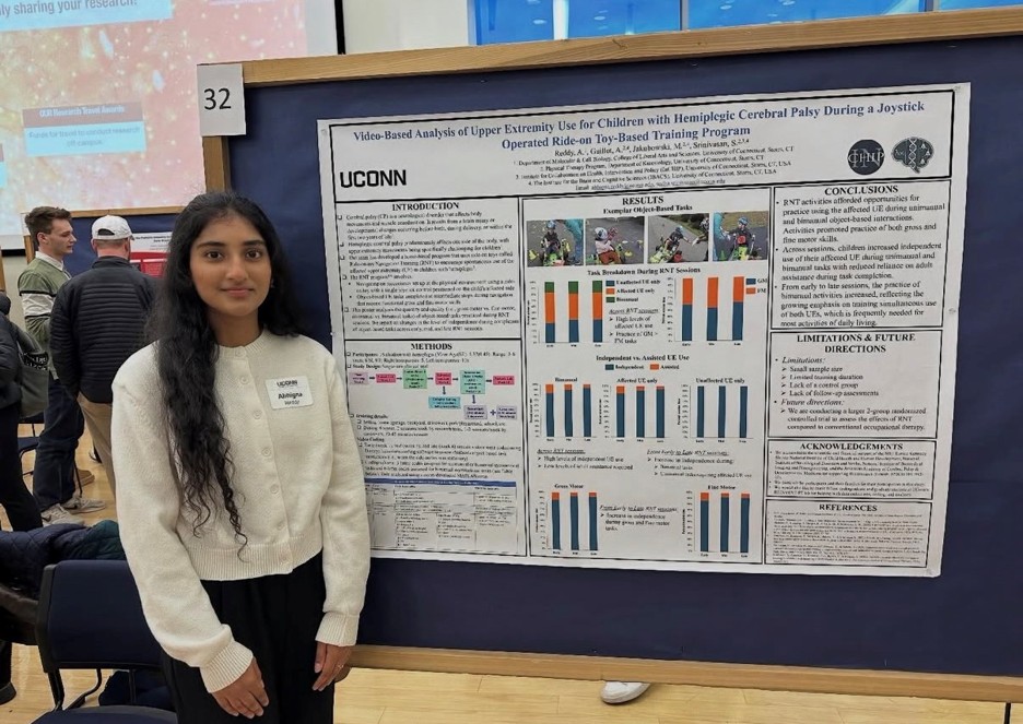 Student standing in front of board
